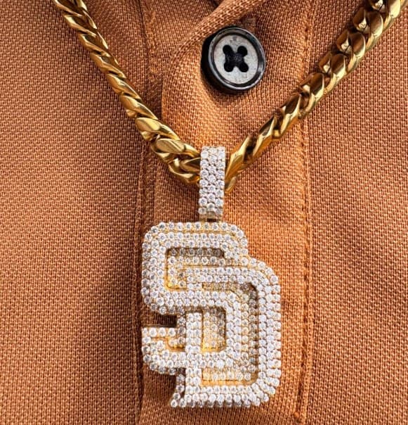 Padres pendant on a gold rope chain